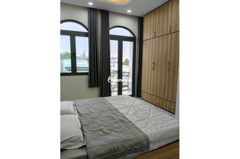 Nhà 1 trệt 2 lầu 12x8,5 Xây dựng 8x8,5 BTCT 4PN 4WC, có Gara Ô tô riêng