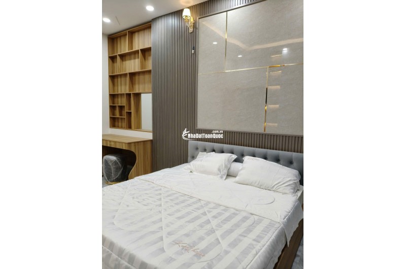 Nhà 1 trệt 2 lầu 12x8,5 Xây dựng 8x8,5 BTCT 4PN 4WC, có Gara Ô tô riêng