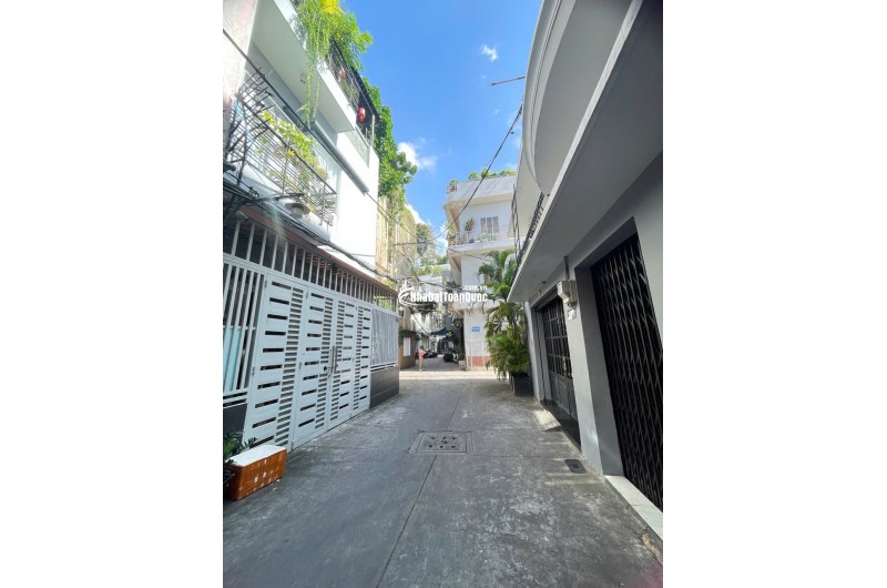 Bán nhà Lạc Long Quân hẻm xe hơi, 60m2, 4 tầng BTCT, giá 8,9tỷ